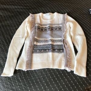 Cream sweeter with brownish/gray accents